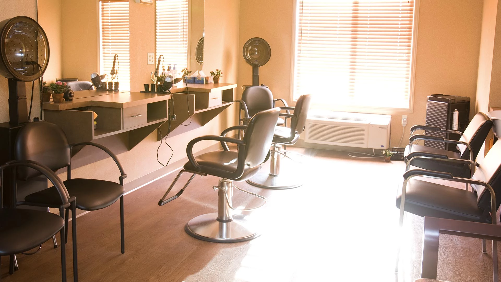 Beauty and hair salon with large window at Summerwood Village retirement home